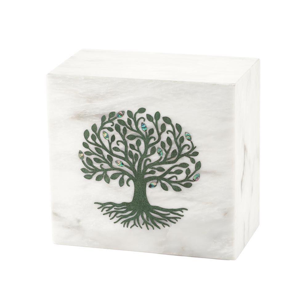 white marble urn with green tree design